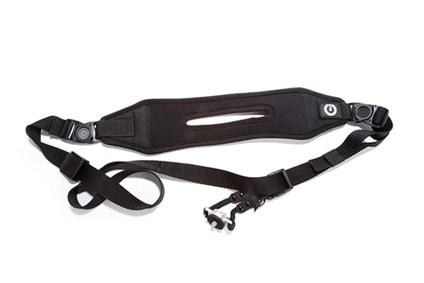 Black camera strap with a white background