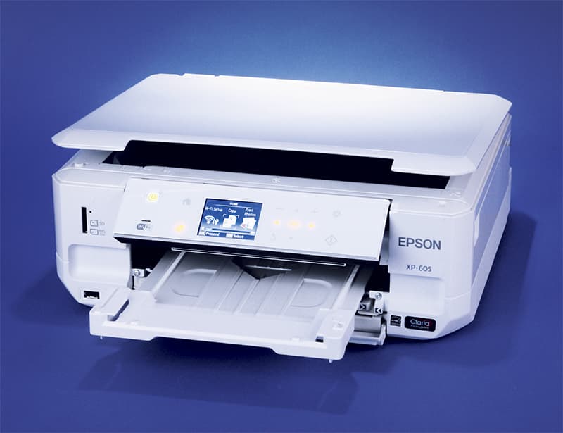 White Epson XP 605 printer with a blue background