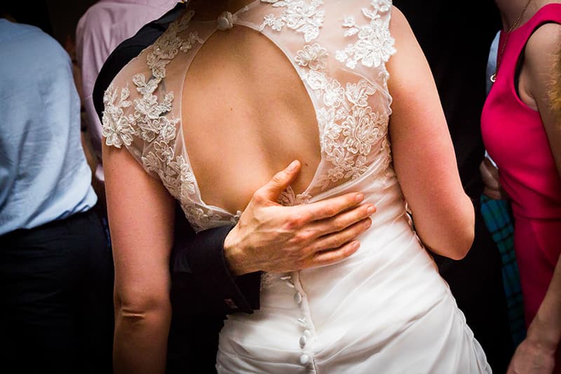 Look for intimate moments, and get some shots of the bride and grooms hands. Photo: Michael Topham