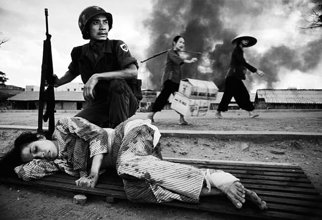 SOUTH VIETNAM. Saigon. 1968. Woman injured by helicopter fire.
