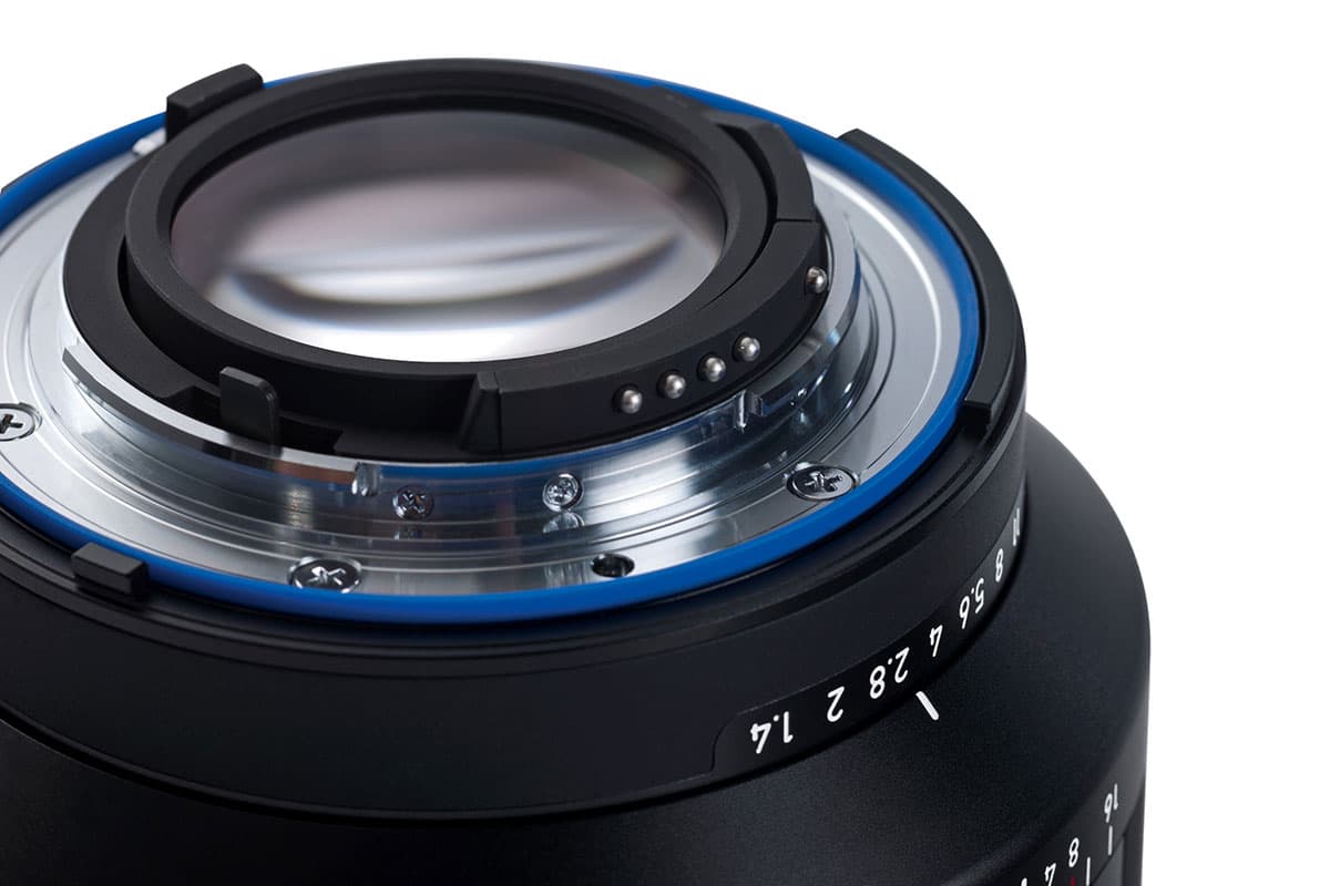 Milvus 1.4/50 for Nikon, showing the blue seal around the lens mount and the de-clickable aperture ring