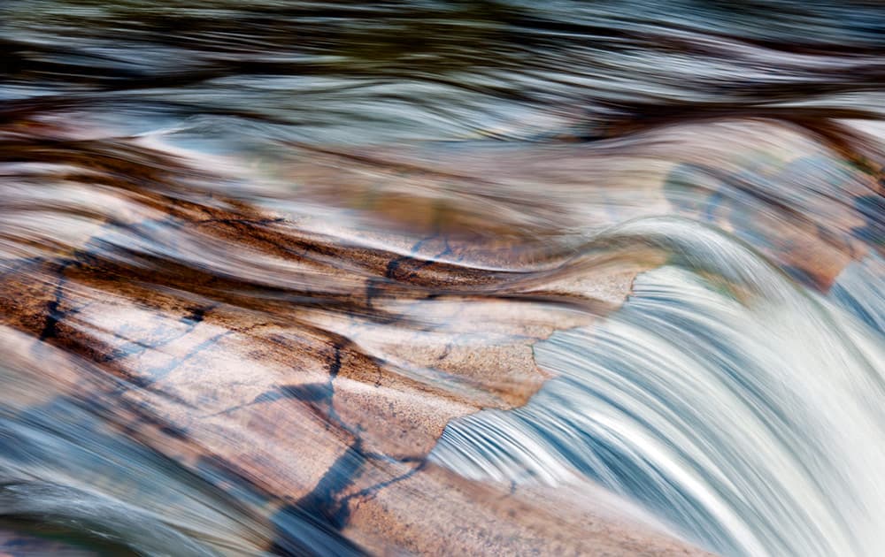 Close-up of water flowing over rocks. Photo: Jeremy Walker