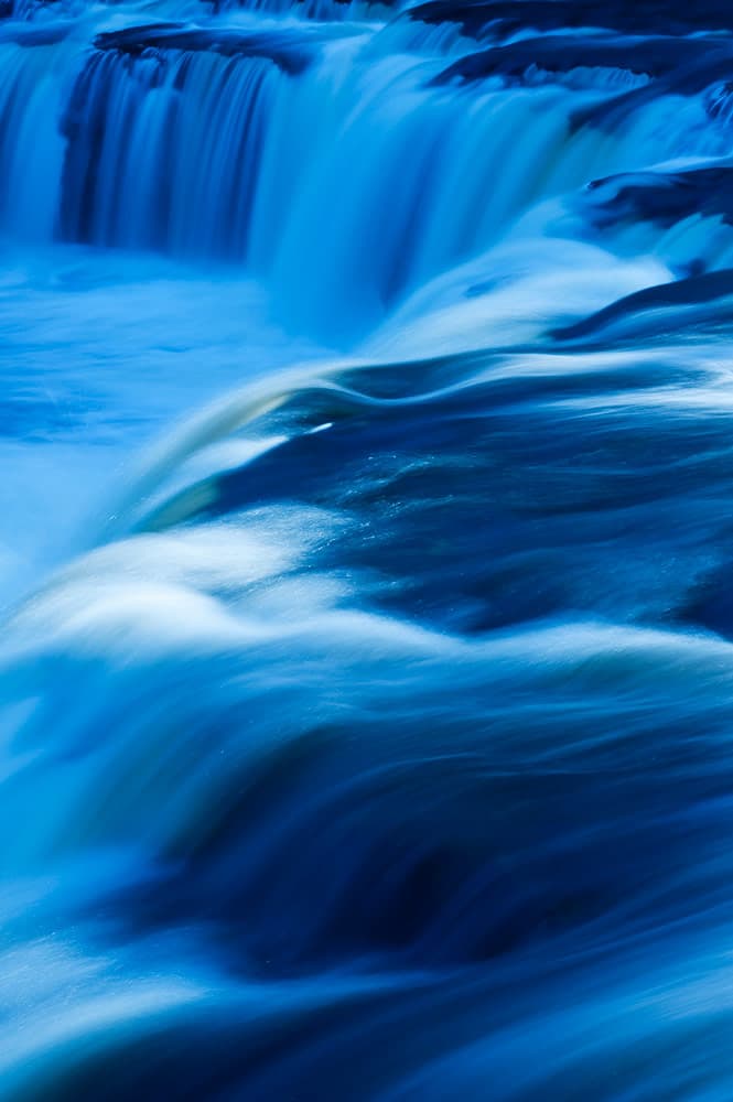 Fast flowing waterfall. Water, blurred motion. Photo: Jeremy Walker