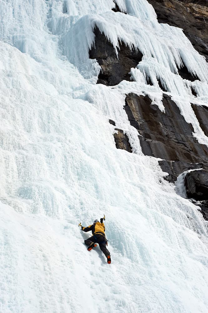 Ice climber on frozen waterfall. Photo: Jeremy Walker