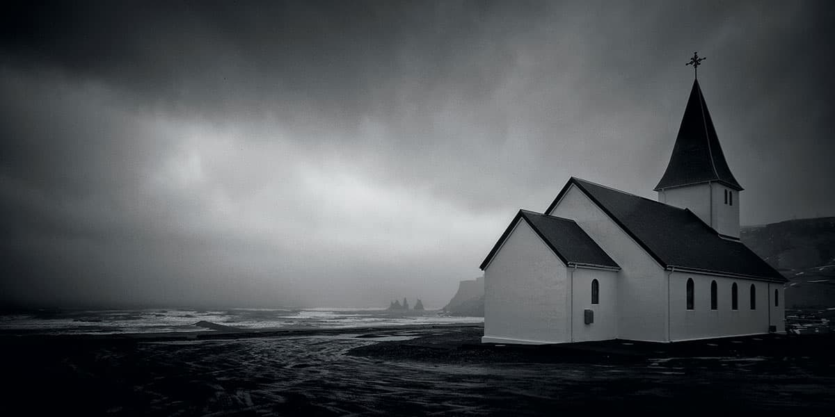 The low angle of this shot, taken in Iceland, has made the church seem as though it's on the beach