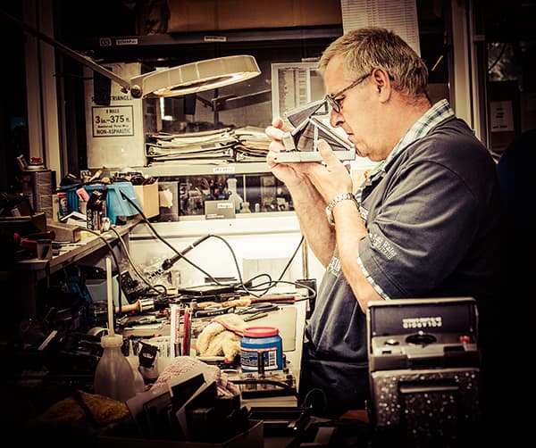 Jos Ridderhof renovating and reparing a Polaroid SX-70 camera