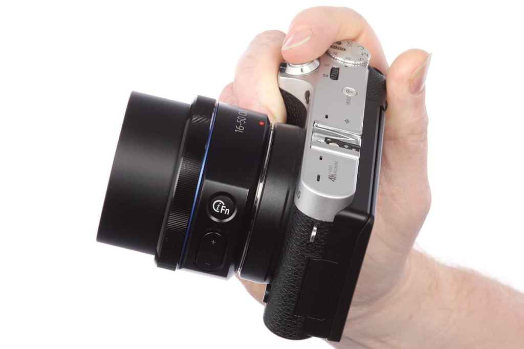 Samsung NX500 in hand. Image: AP