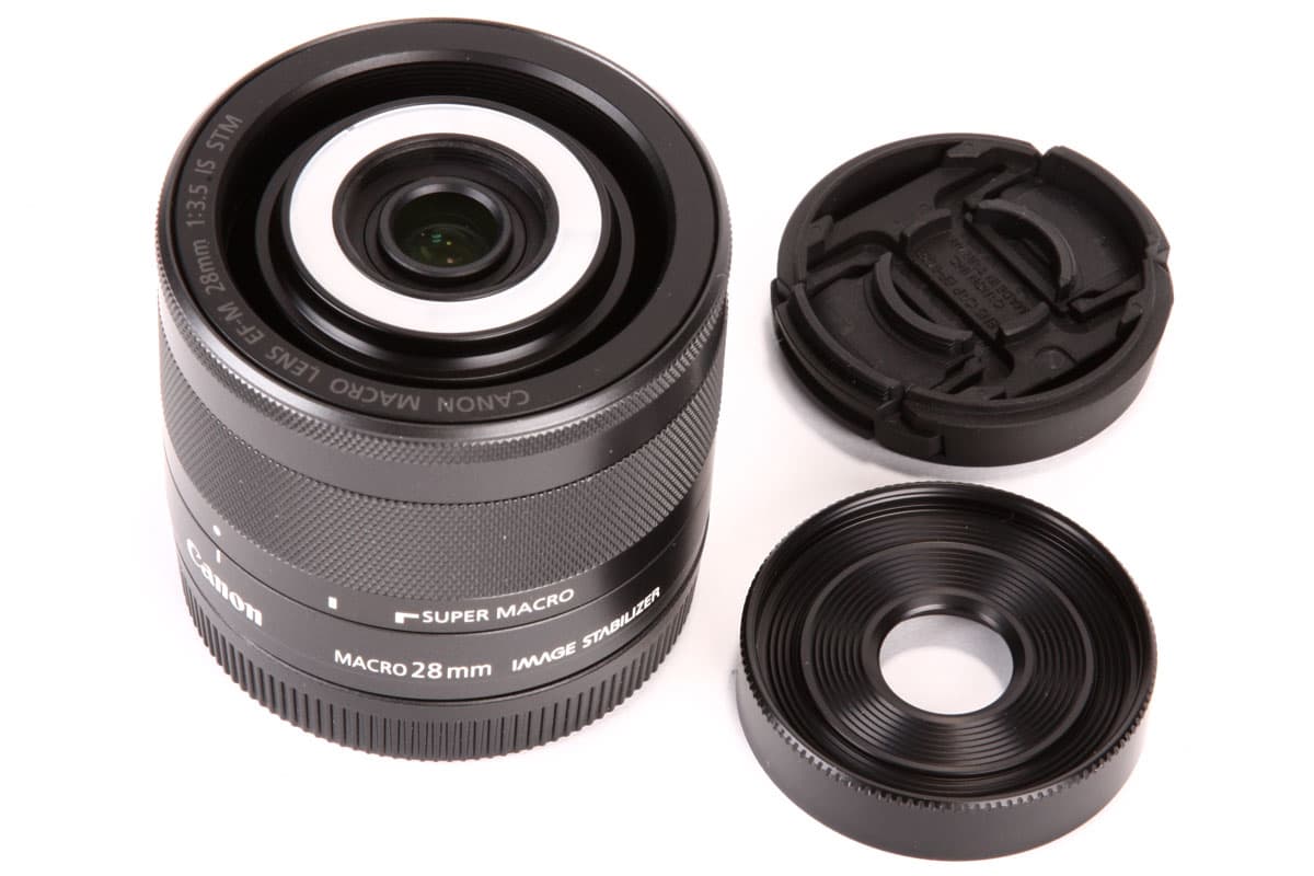 The full kit includes the lens, screw-on filter adapter, and custom front cap