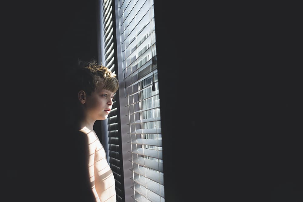 Amy Drucker son in window
