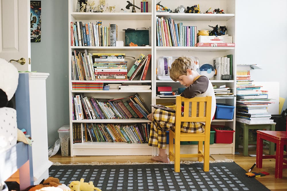 Amy Drucker son reading to hamster