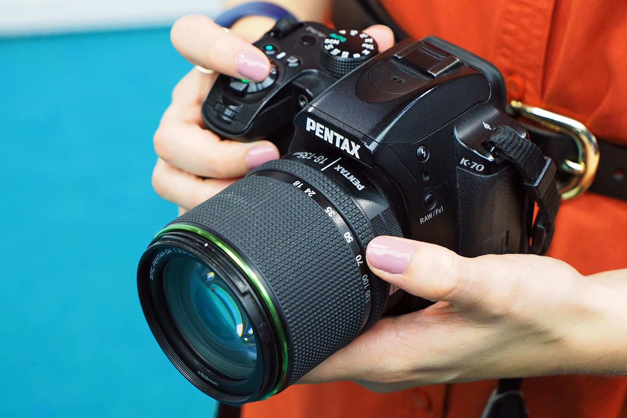 Pentax K-70 in hand, as used by Jessica Miller, photo: Joshua Waller