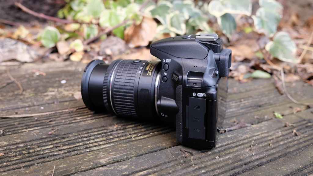 Nikon D5600 with 18-55mm f/3.5 – 5.6G VR kit lens, left side view