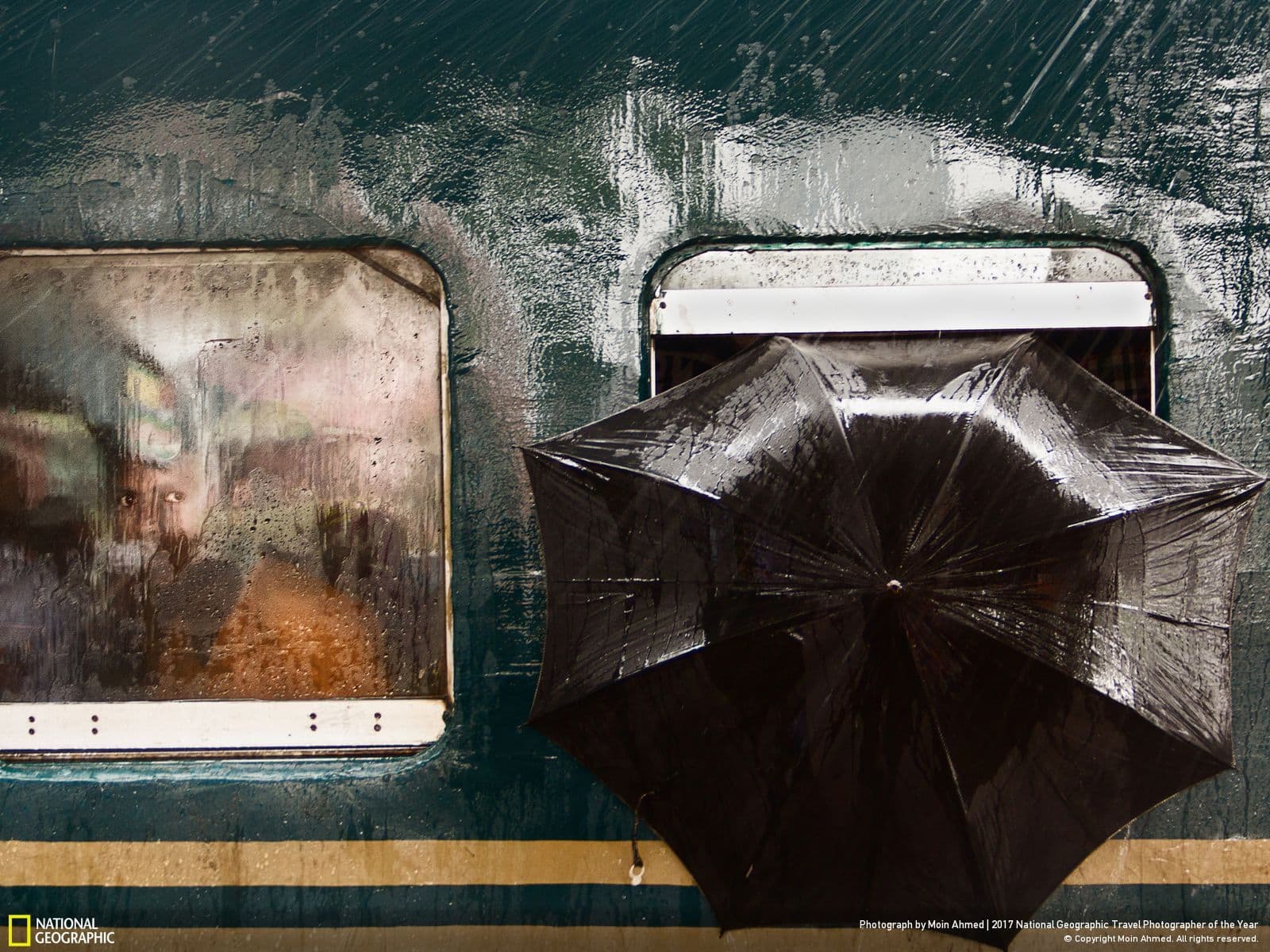 umbrella out of a train window