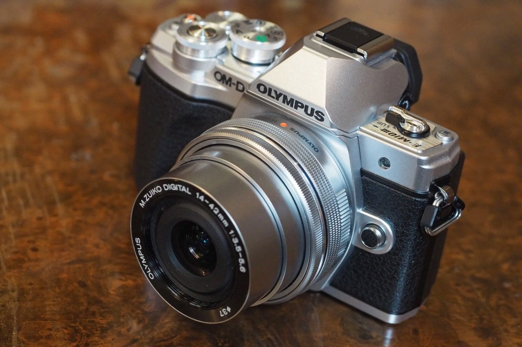 The Olympus OM-D E-M10 Mark III is a mirrorless camera styled to look like an old film SLR