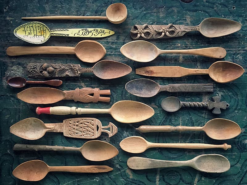 still life of a collection of wooden spoons