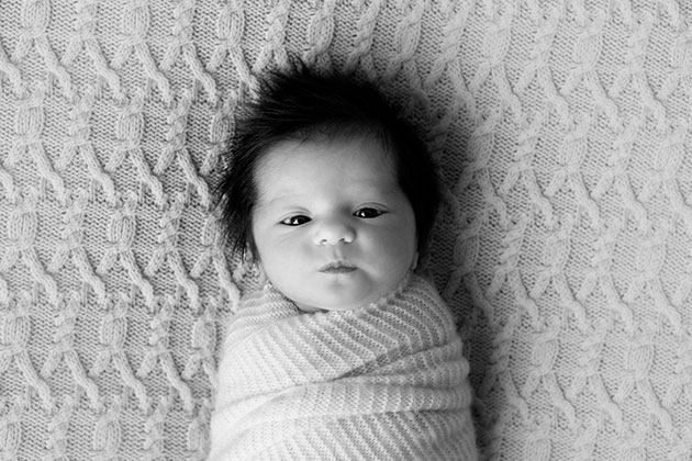 Newborn photography swaddling