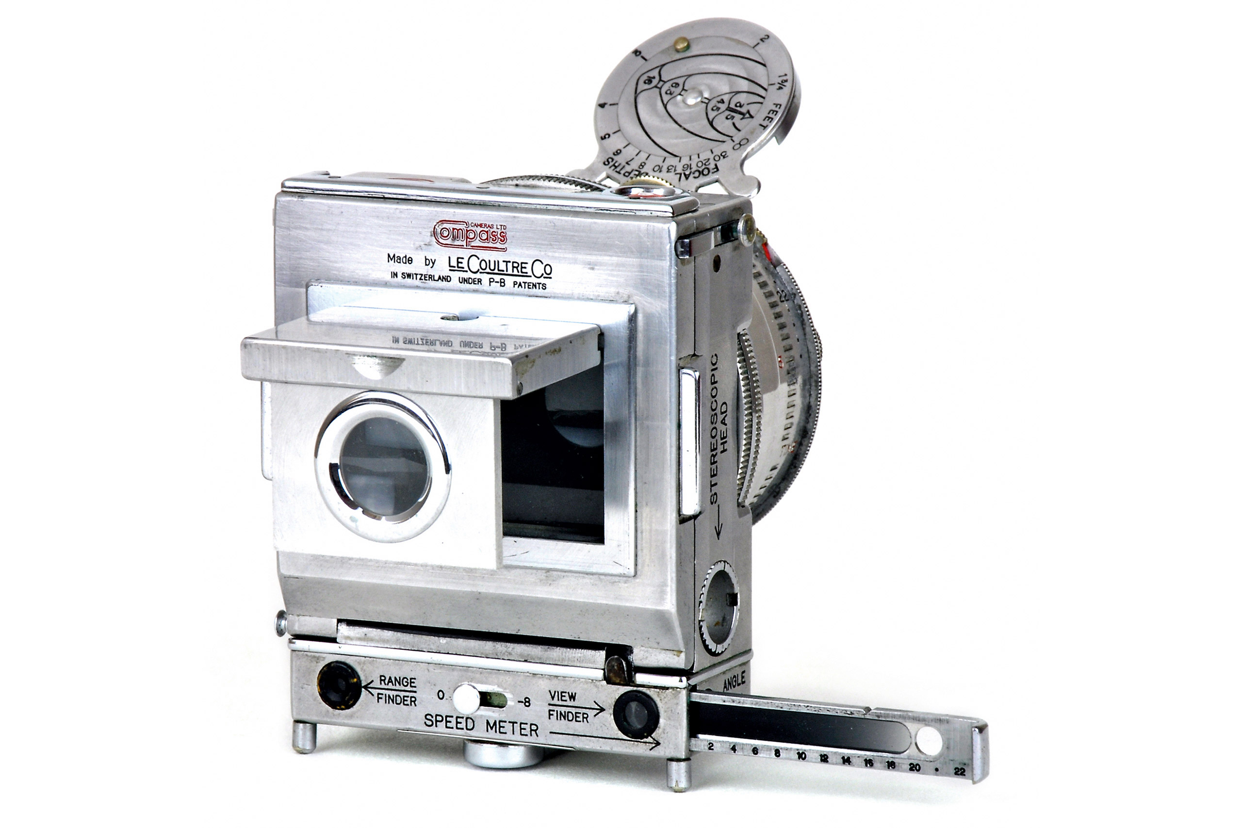 Rear view, showing the viewfinder and rangefinder windows, the extinction meter, ground-glass screen and its magnifier.