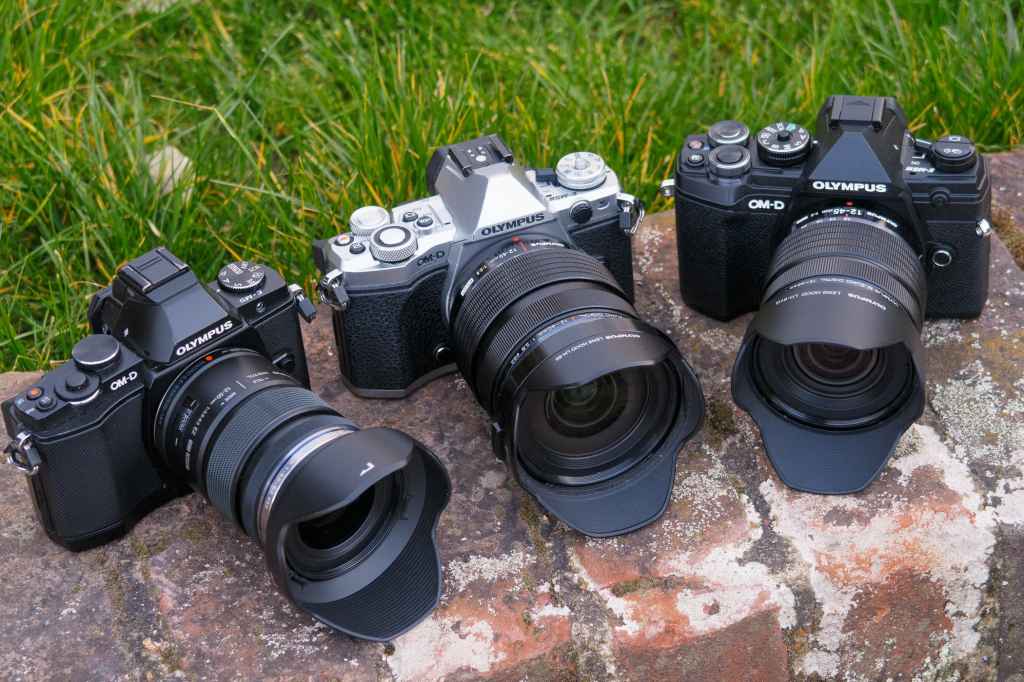 Olympus 12-50mm f/3.5-6.3 on E-M5; 12-40mm f/2.8 on E-M5 II; 12-45mm f/4 on E-M5 III, all with hoods fitted