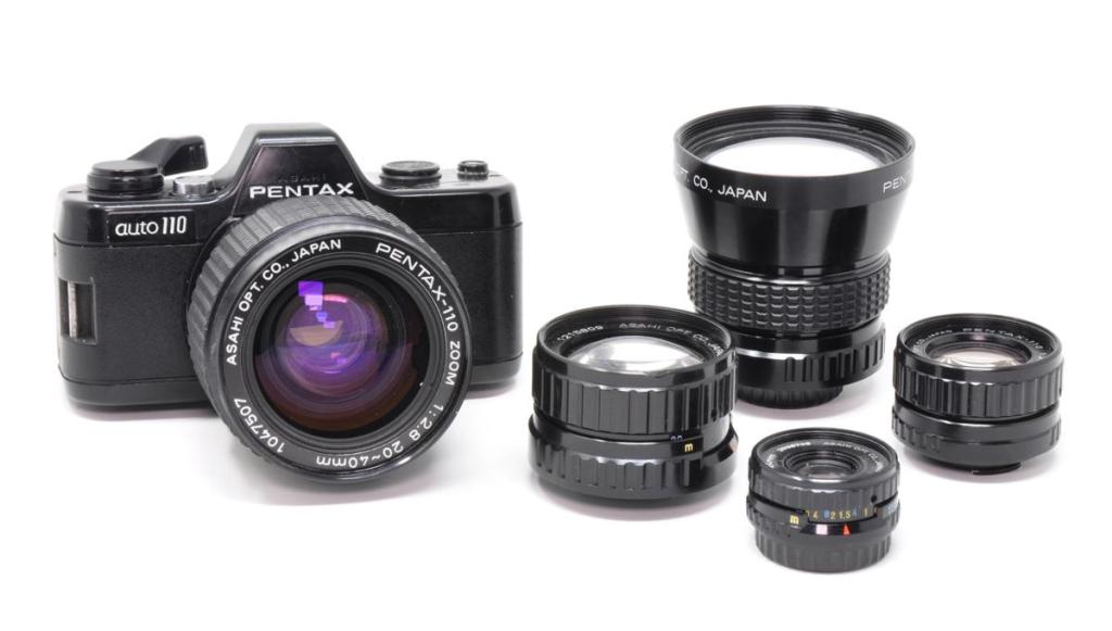 Pentax Auto 110 with 20-40mm zoom lens fitted, plus 24mm standard, 18mm wideangle, 50mm and 70mm telephoto lenses