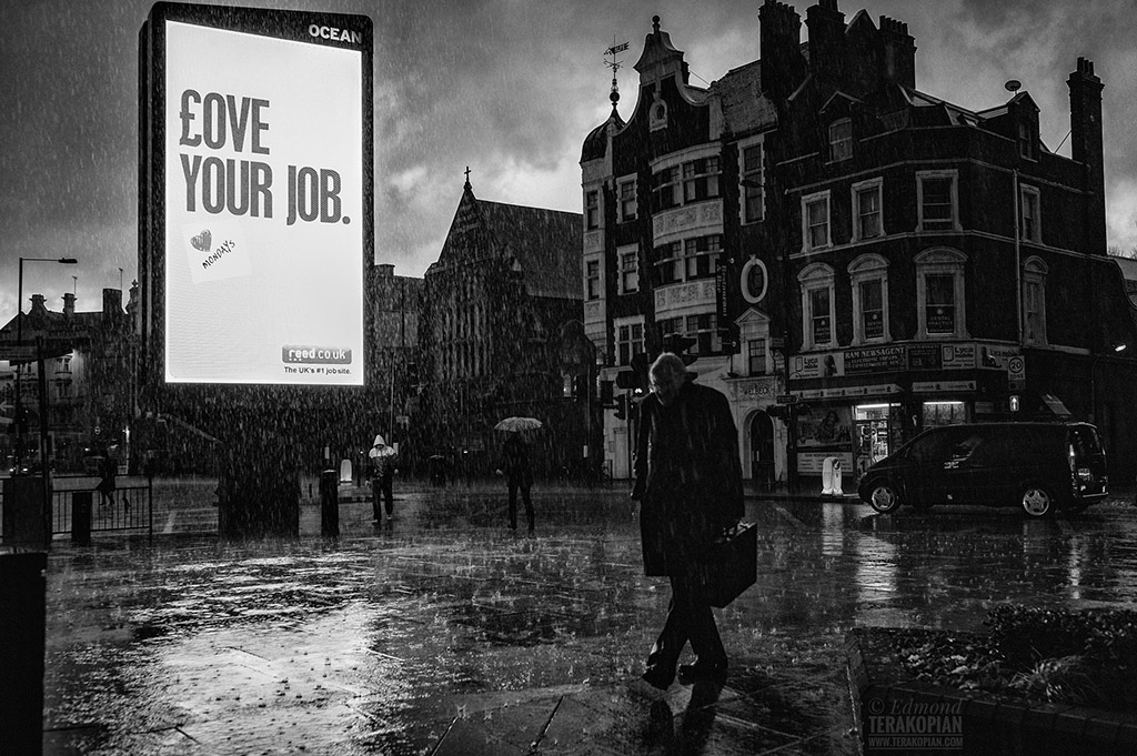 rainy black and white street photography love your job advert