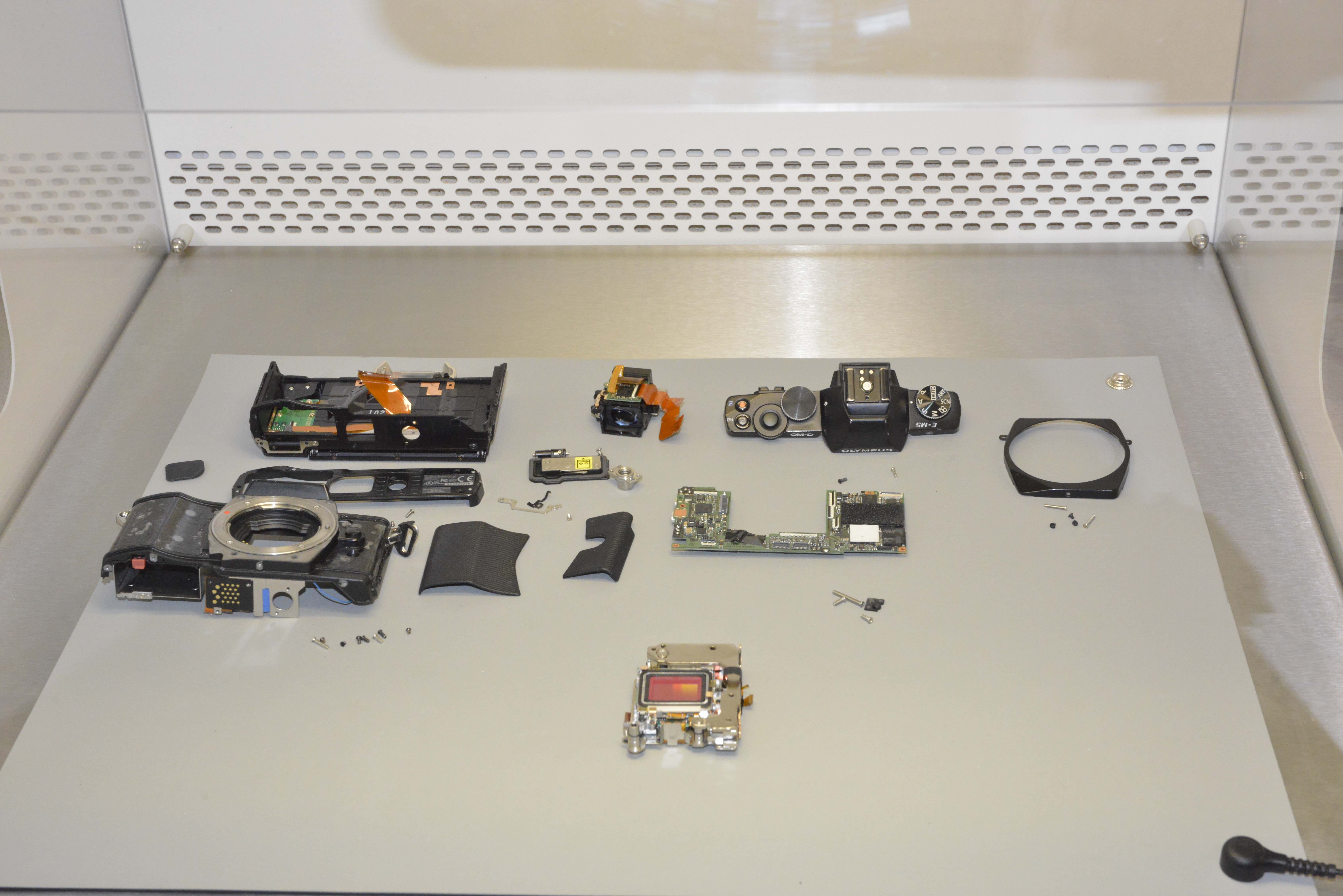 An Olympus camera in pieces