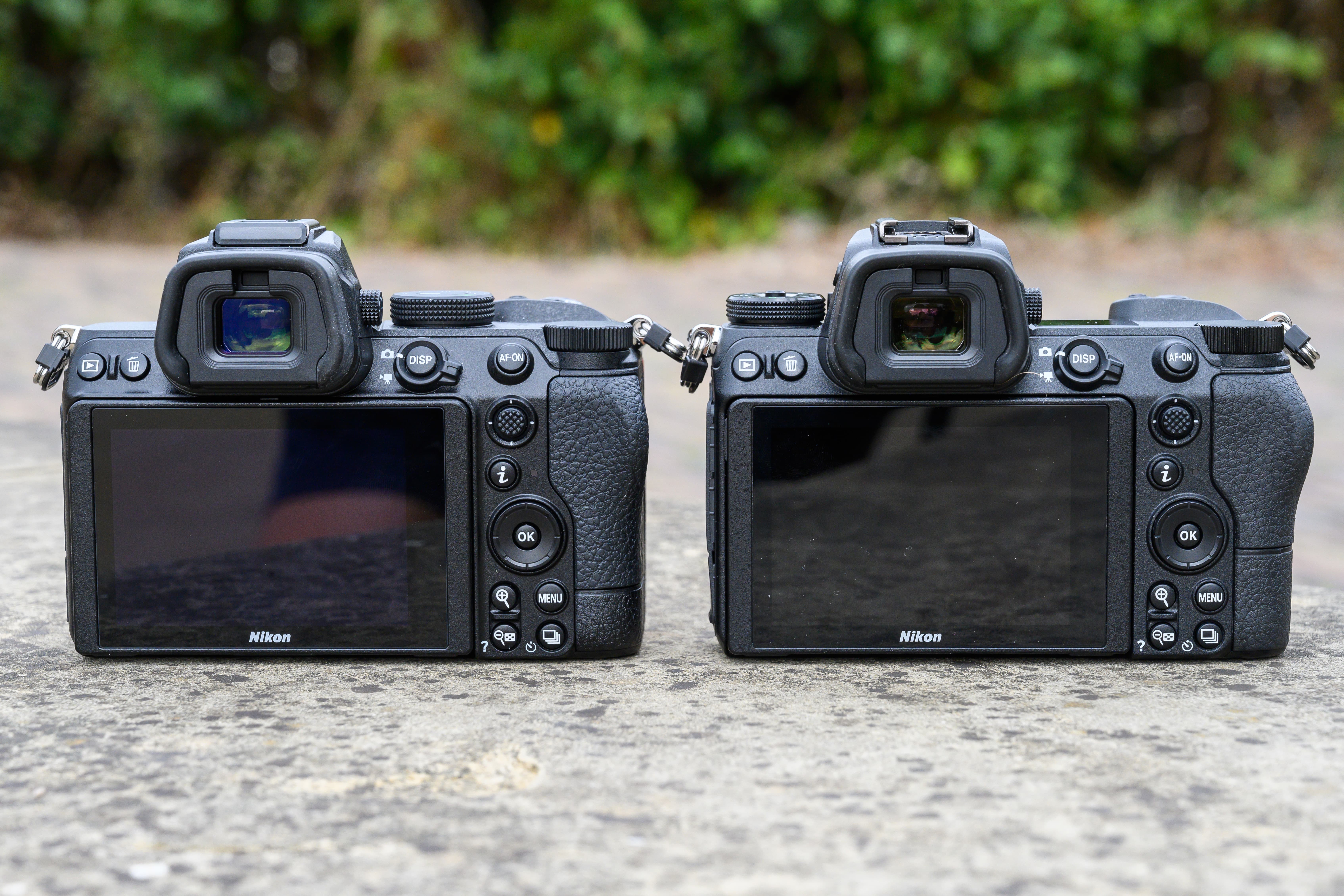 The Nikon Z5 (left) and Nikon Z6 (right). The general feel of the Nikon Z5 in the hand is very similar to that of the Nikon Z6, albeit with a different layout and no display panel on the top plate