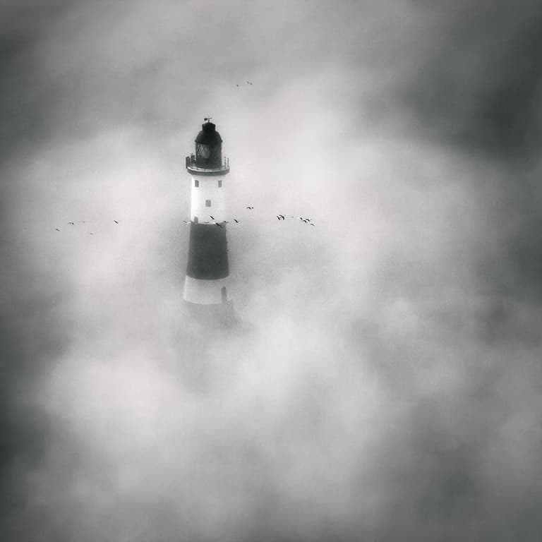 Towerlight emerging out of the fog