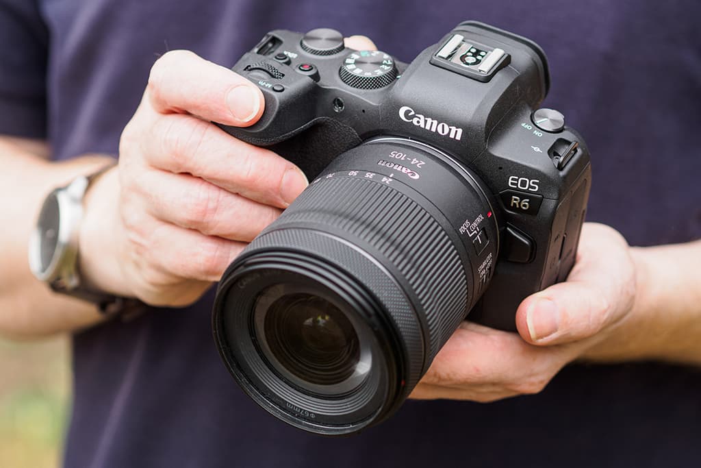 Canon EOS R6 with RF 24-105mm f/4-7.1 IS STM lens in hand