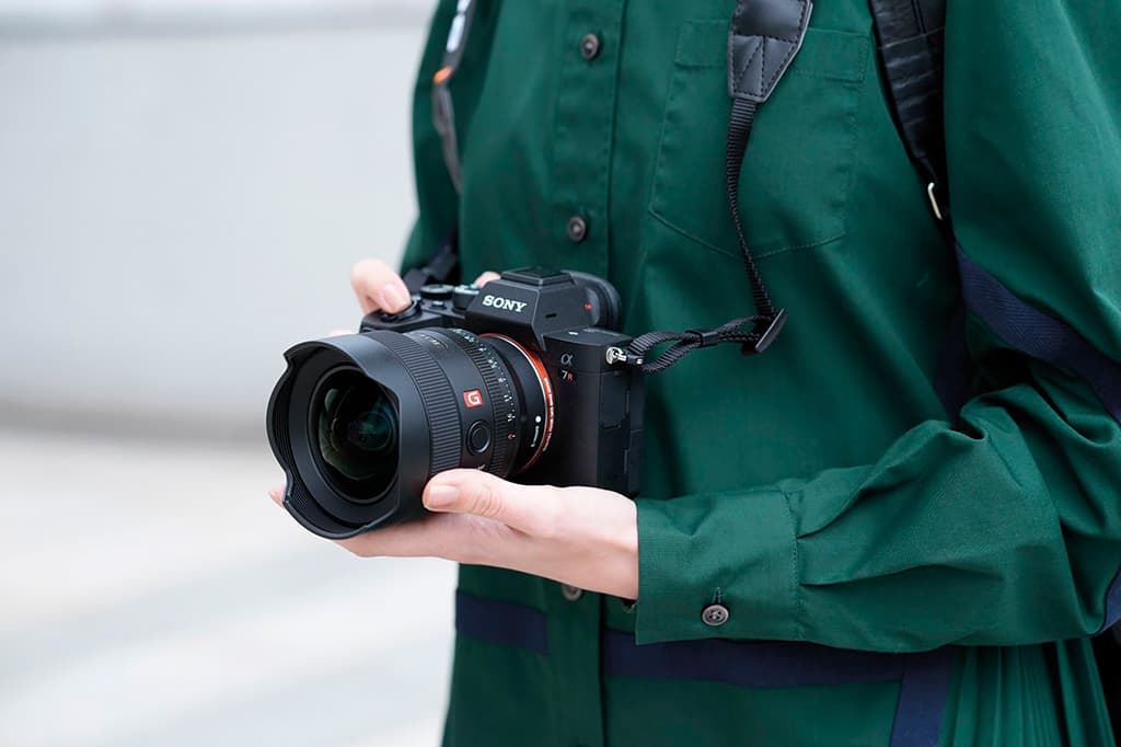 Man holding a Sony camera