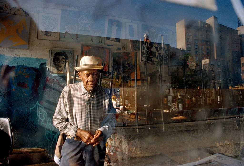 Julia Gillard street photograph of a man through a window
