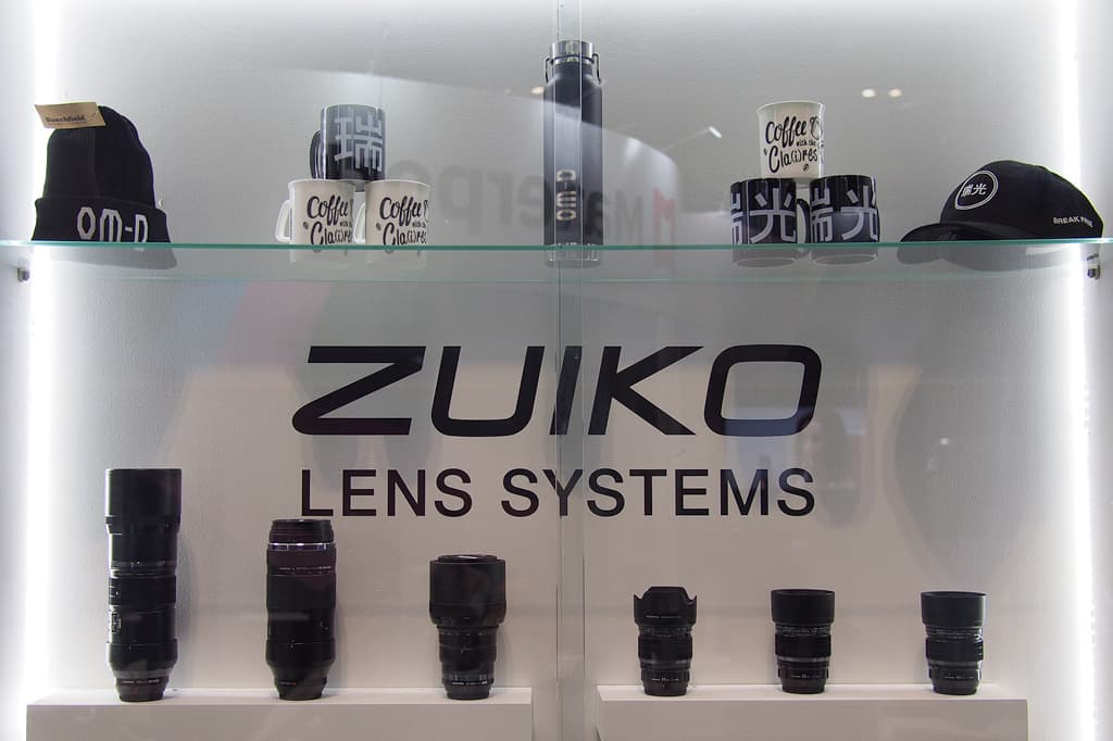 Olympus Zuiko Lenses and Branded Merchandise at TPS