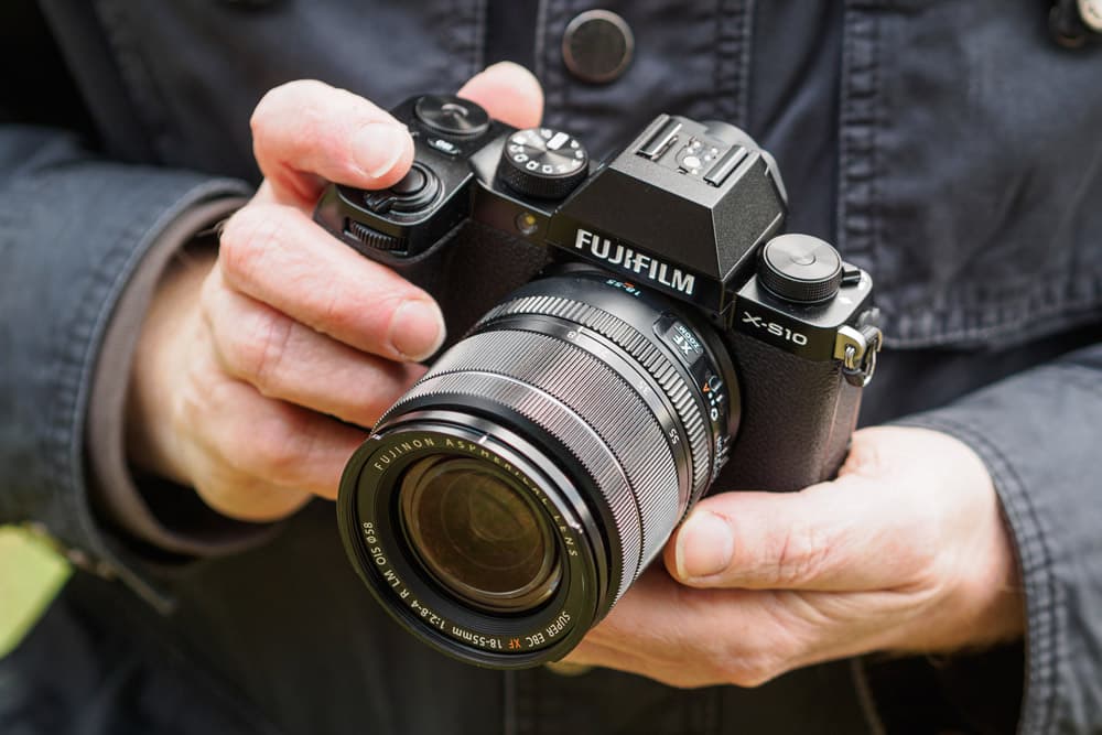 Best Fujifilm camera for budget conscious wedding photographers: Fujifilm X-S10 in hand (Andy Westlake)