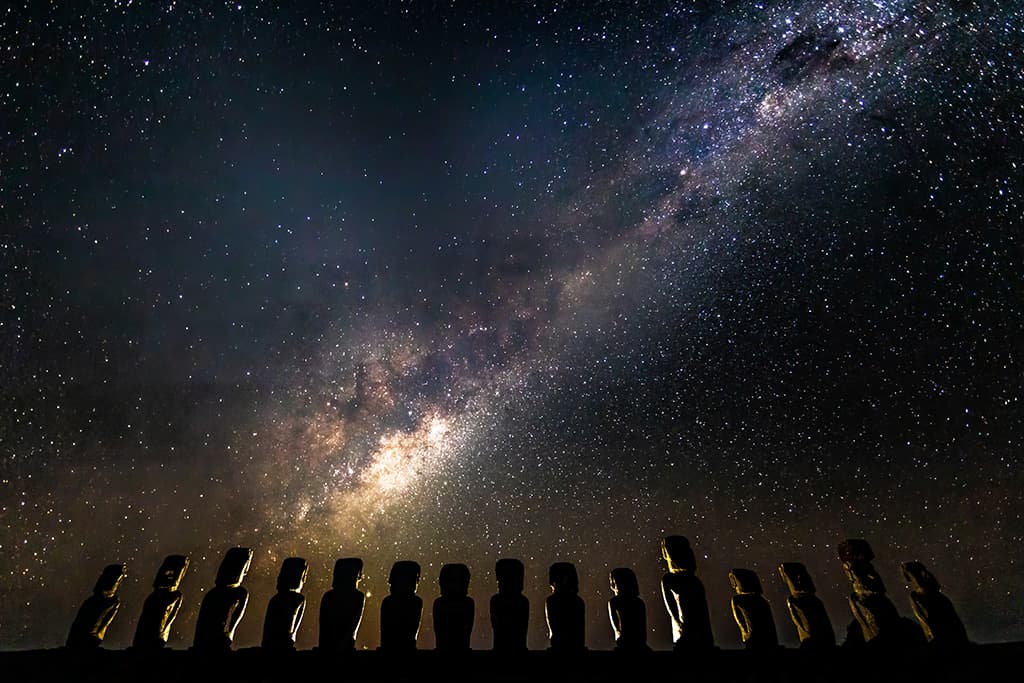 Milky Way over a row of moai on Easter Island (Rapa Nui), in the south-eastern Pacific Ocean