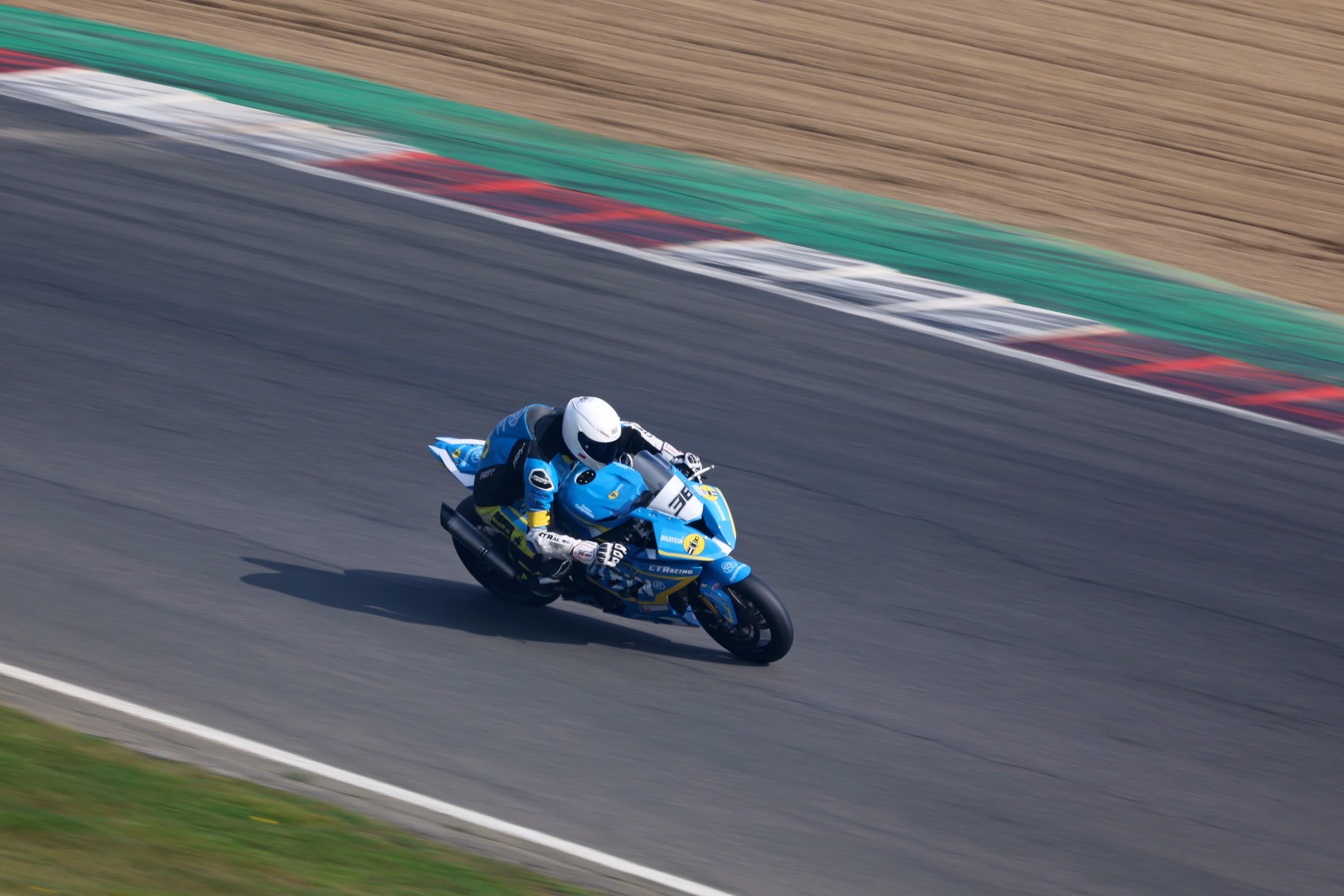 Canon EOS R3 motorcycle racing sample image with panning