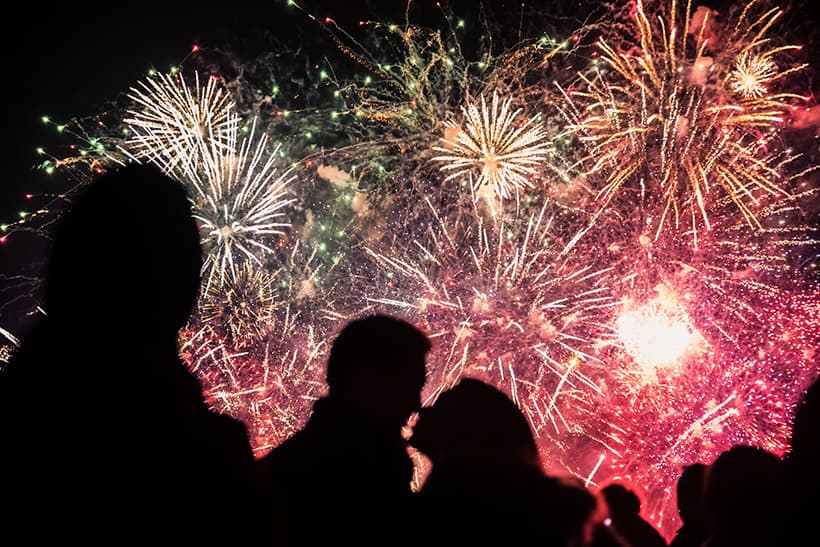 capture silhouettes infront of fireworks