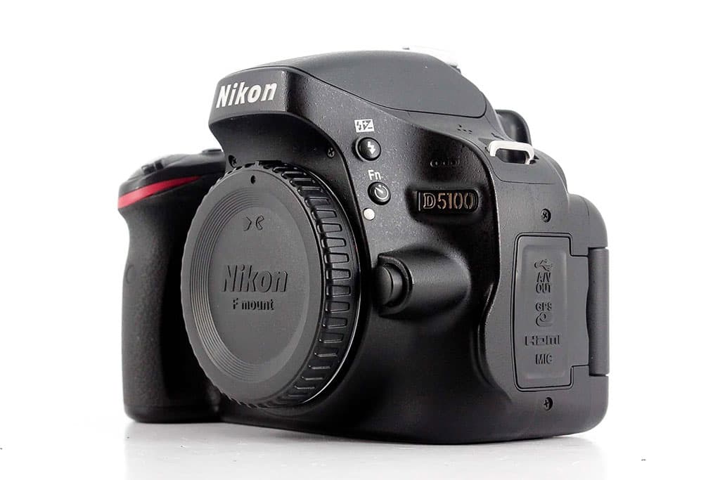 Nikon D5100 photographed body-only with body cap