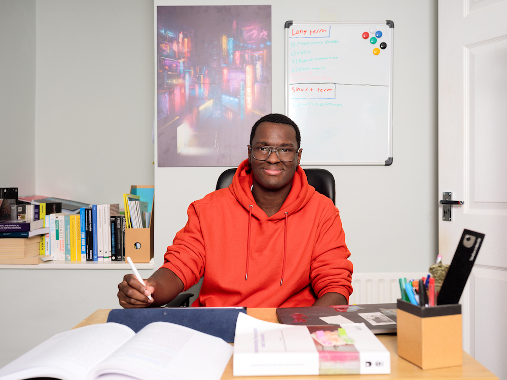 OU student Joe, from Essex, who is a pharmacy assistant studying to be a psychologist. Image: Inzajeano Latif