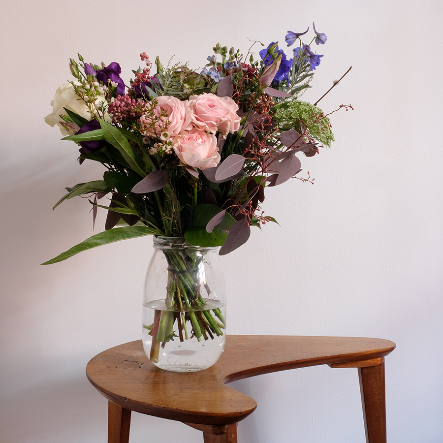 bouquet of flowers on side table