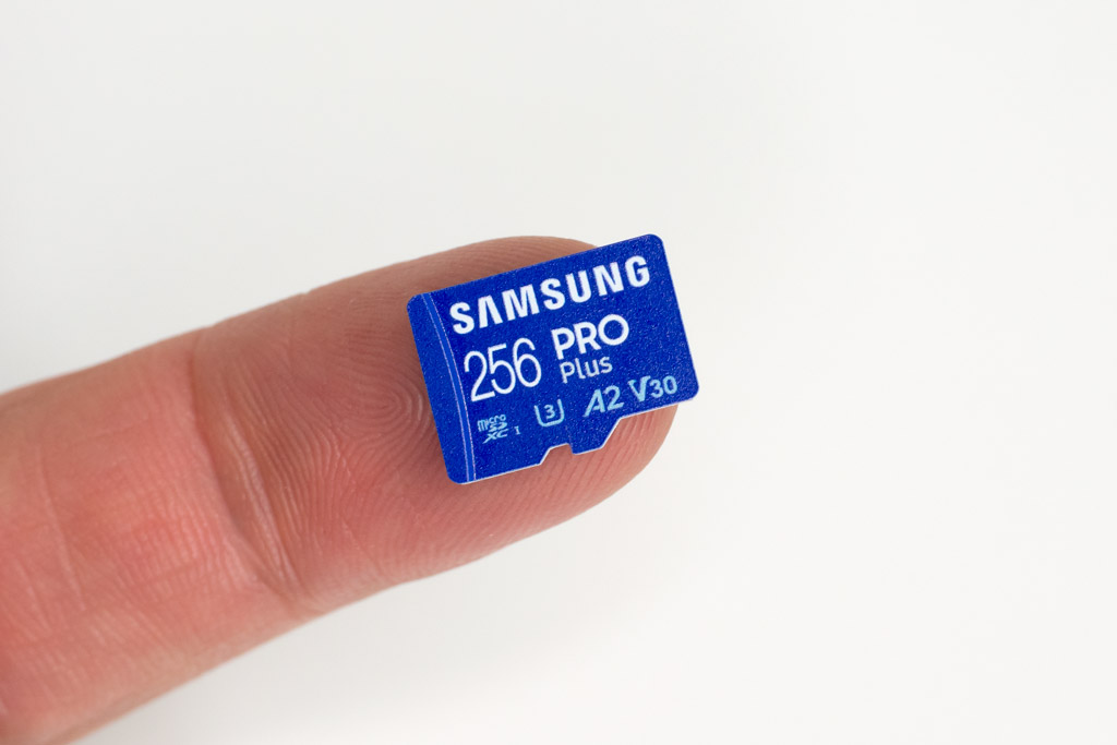 Samsung PRO Plus MicroSD card on finger