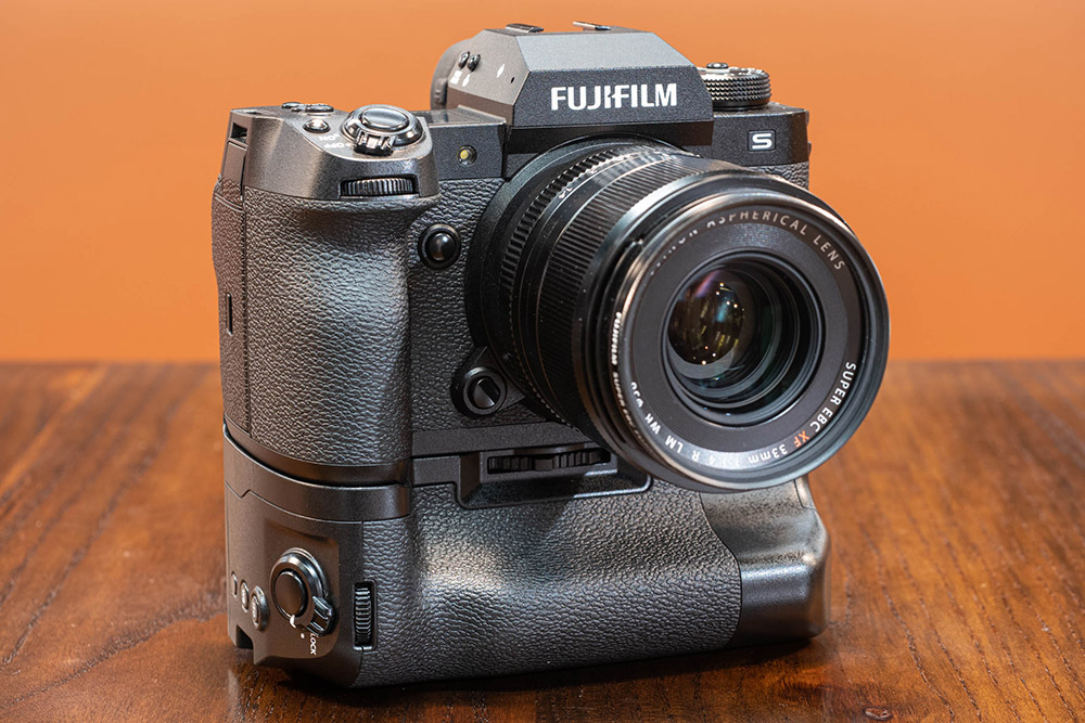 Photograph of the Fujifilm X-H2S with battery grip. 