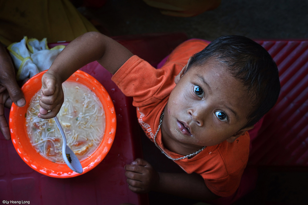 Charity Meal by Hoang Long Ly (Vietnam), shortlisted in World Food Programme Food for Life category of the Pink Lady® Food Photographer of the Year 2022 awards
