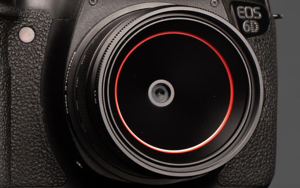 A close-up of the Pinhole Pro Max on a Canon EOS 6D DSLR