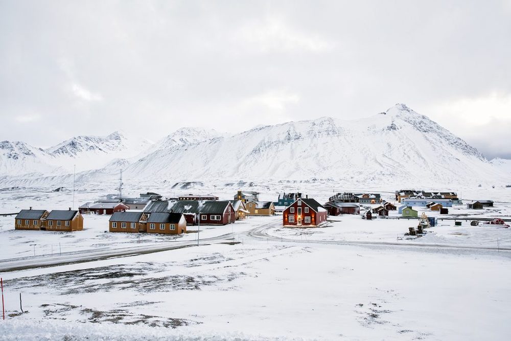 RESEARCH AT THE END OF THE WORLD Ny Alesund settlement, Svalbard. The Research Centre, formerly a coal mining town, is the largest laboratory for modern Arctic research in existence. There are representations from 11 countries. © Anna Filipova, winner Marilyn Stafford FotoReportage Award 2019