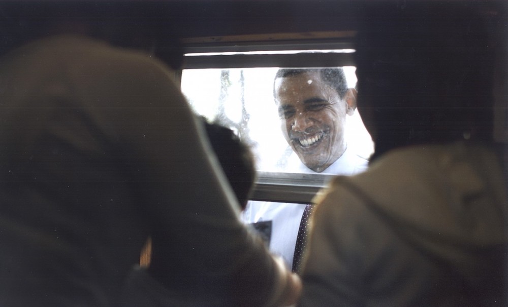 Senator Obama buying tickets for food and rides at the Sombrero Festival in Brownsville, Texas. Damon Winter won a Pulitzer Prize in 2009 for his coverage of the election campaign of Barack Obama. Image: Damon Winter/ The New York Times