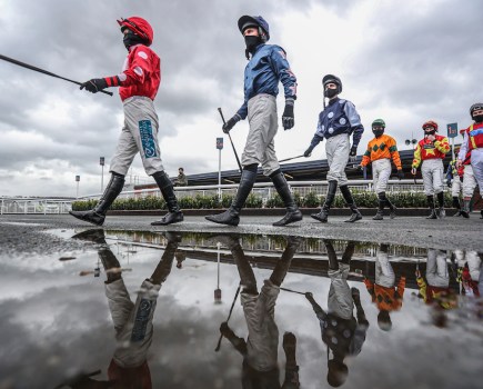 Jockeys make their way out for the Proper Good Dairy Maiden Hurdle at Ludlow Racecourse, Wednesday 24 February 2021. © David Davies/SJA British Sports Journalism Awards