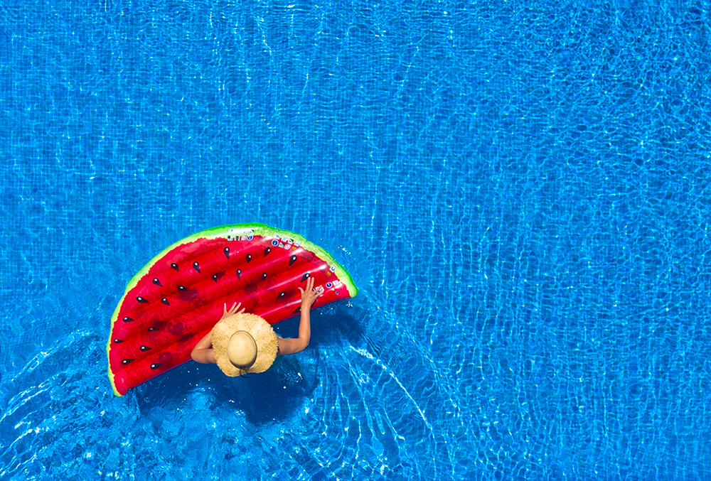 overhead view of pool and watermelon float, travel photo