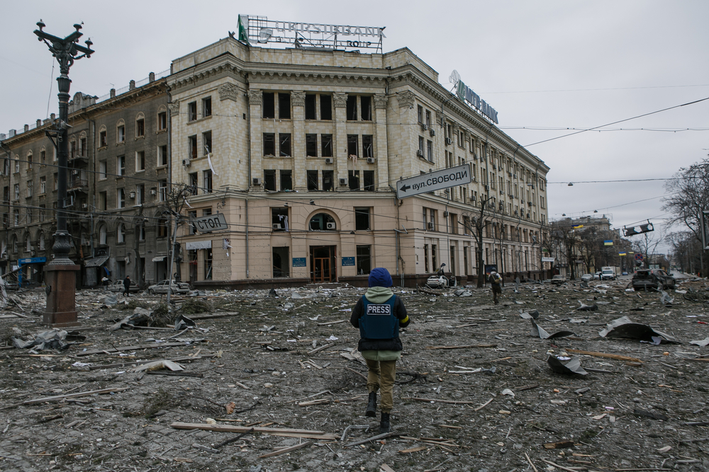Press in the destroyed centre of Kharkiv, Ukraine. Photo: Pavel Dorogoy, courtesy Deposit Photos