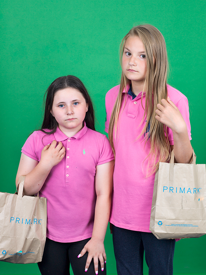 image of two girls holding primark bags by casey orr