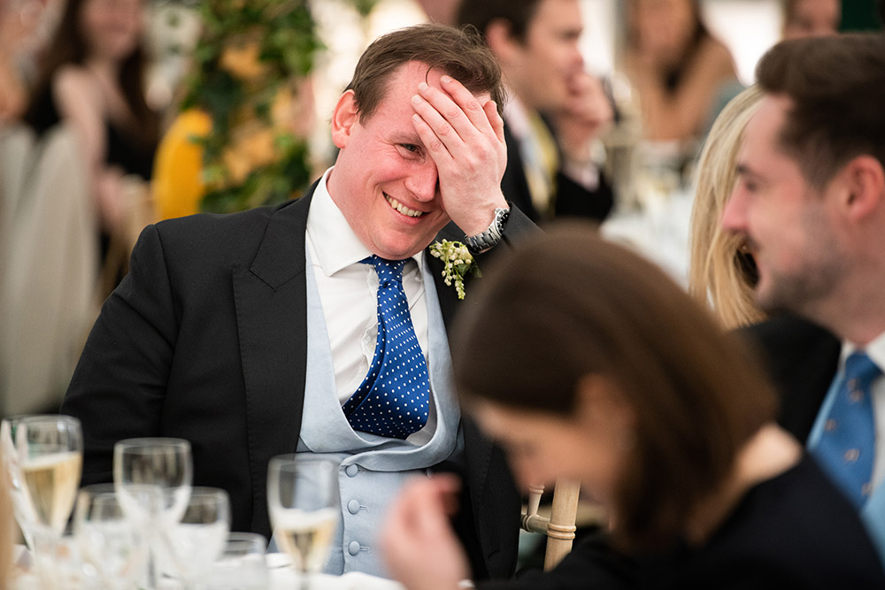 laughing at wedding speeches