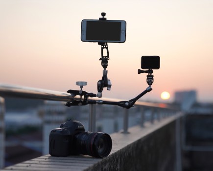 One of the new Vanguard VEO clamps in use on a railing